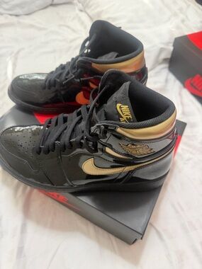 Nike Air Jordan 1 high Black with Gold Accents Men's Sneakers